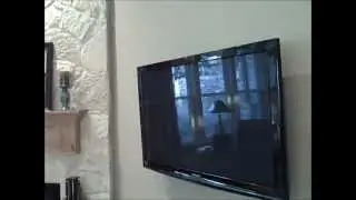 Austin home theater by Hifi Install 512-814-8171: HDTV Wall Mount Surround Sound Installation