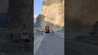 Cutting Dangerous rocky hill for road expansion.#komatsu #jcb #excavator #earthwork #kobelco
