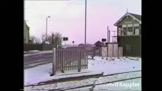 Part 2 of 5. A mix of trains at Helpston LC on the East Coast Main Line – 22nd December 1981.