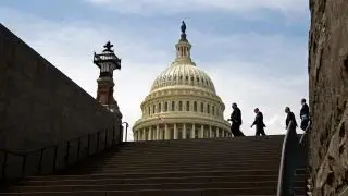 Why did Podesta resign from his lobbying firm?