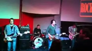 Jonathan Gluck and the Wayward Kind performing live.