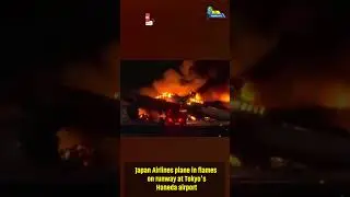 Japan Airlines plane in flames on runway at Tokyo's Haneda airport.