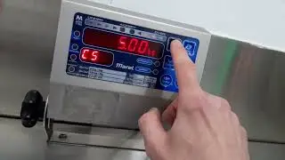 Marel M1100 scales, How to reset E11- error and calibrating with 3kg of weight .