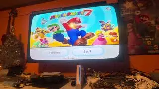 My Wii menu + USB loader GX menu (Wii)