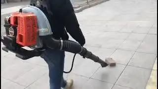 Backpack Air Blower Leaf Blower Snow Blower Blowing a Brick