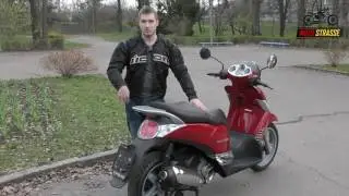 Обзор макси-скутера  Aprilia Scarabeo 250ie ABS (2011)