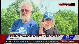Farmer watches Colts from his backyard near Grand Park