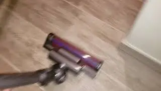 Dyson Cinetic Canister, vacuuming tile floor.