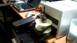 Microboards QDL-1000 disk duplicator in action
