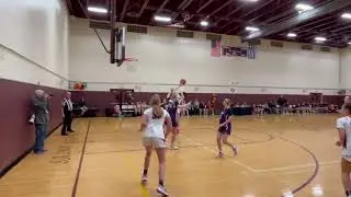 Trinity Hall's Jr.  Nina Emnace drive to the basket and one!
