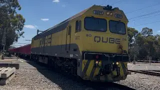 Qube: The Barbie Express (4120) with G521 passing Parafield railway station