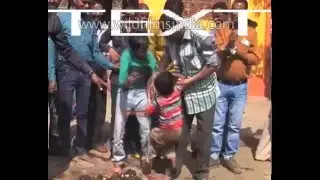 Indian kids thrown into Cow Dung, as part of ritual