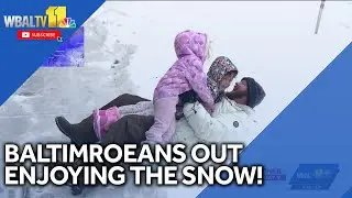 Baltimoreans enjoying big snowfall