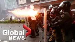 Hong Kong police fire water cannons, tear gas as protesters take to the streets