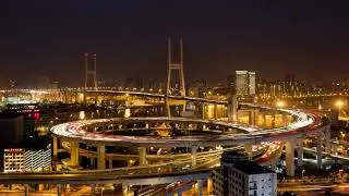t l day to night high angle wide shot traffic on nanpu bridge spiral shangh