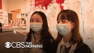 One year after coronavirus symptoms were first detected, CBS News returns to Wuhan