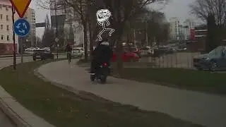Moped kids seem to believe they have priority driving over a crosswalk!