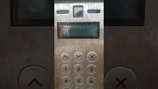 Me scanning my Paxton fob on a Paxton intercom
