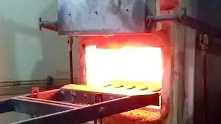 Fire Assay - Loading the pots into furnace (1050 &deg;C)