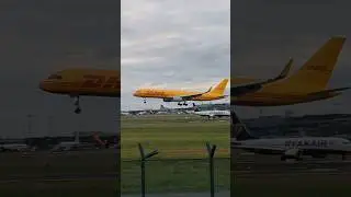 DHL Cargo touching down on RWY 28 at Dublin Airport with a Ryanair 737 awaiting clearance! #airport