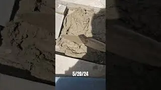 Installing Pennsylvania Blue Flagstone around the new drain.#construction #stone #natural #work #fun