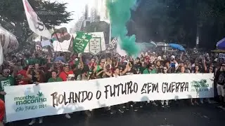 Activists march in S&atilde;o Paulo in support of the legalization of marijuana in Brazil