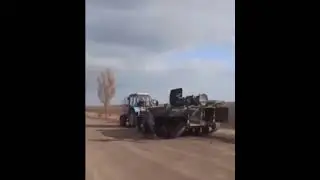 Ukraine's farmer took an abandoned Nazi Russia's army APC for scrap metal