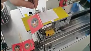 Toothpick flag labeling machine