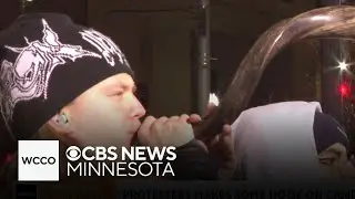 Anti-ICE protesters face off with police outside hotel in Minneapolis