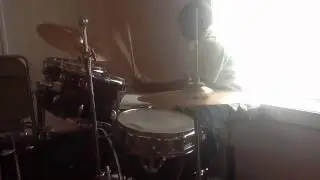 7 year old Joshua Cason on drums and 14 year old Shod Washi