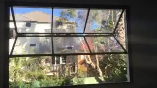 Minimal steel frame 5m high window (by Vincenzo) Bondi NSW