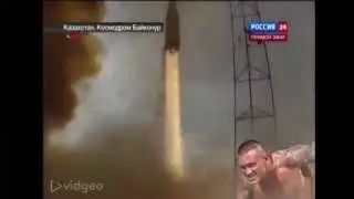 Randy Orton RKO's a rocket from outta nowhere.