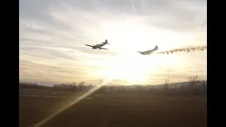 Low flyby Yak 50 and Yak 52 at sunset
