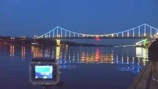 Festive illumination on Park Bridge in Kyiv, look this video