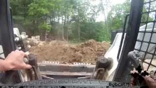 Bobcat A300 Loading Tri-Axle Dump Truck