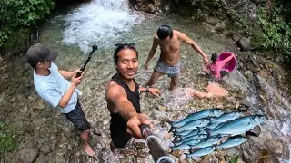 In rural villages of Nepal, fish are caught and taken out of the river in this way.