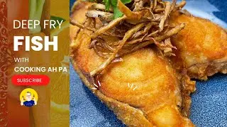 Deep frying fish with with Cooking Ah Pa