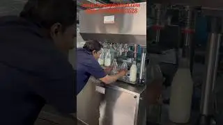 Milk filling machine, 1500 Bottle/ Hour Gravity based milk filling machine, Milk packing machine