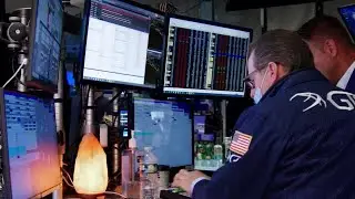 Wall Street ends lower as investors digest Trump's auto tariffs | REUTERS