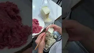 Folding and filling dumplings with bamboo for traditional food prep
