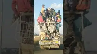 Overloading a bakkie with cargo and passengers in South Africa