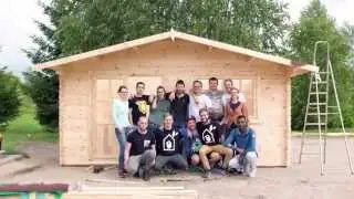 Log cabin installation by Quick Garden LTD sales team
