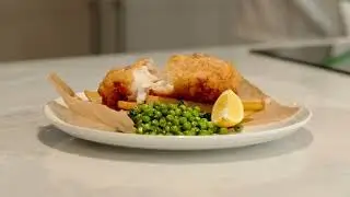 A Classic Cod & Chips With Crushed Minted Peas.