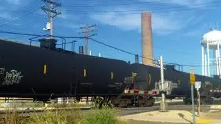 CSX 153 leads WB BNSF empty ethanol