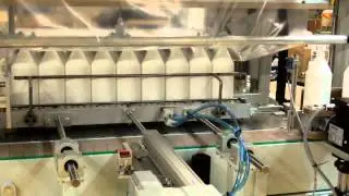 Pakkemaskine der pakker en 1 liters flaske