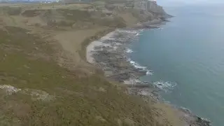 Flying over the stunning cliffs of Southgate / Hunts Bay, Gower
