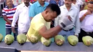 World Record For Coconut Smashing With Elbow