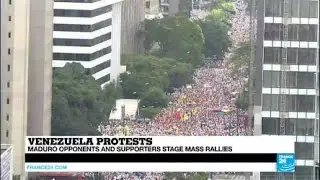 Venezuela: thousands of opposition supporters take to the streets of Caracas in a massive rally