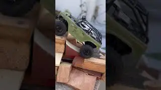 SCX24 Deadbolt RC mini crawler doing a lil scrap pile crawling