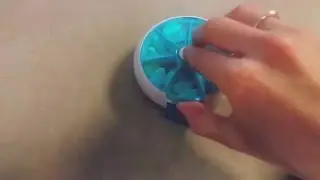 Push button pill case